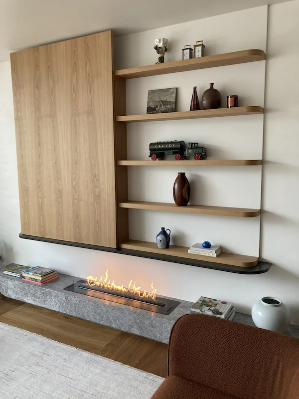 Northern Beaches Manly custom steel shelving brackets supporting floating timber shelves with modern interior design integration - precision residential metalwork by A&E Metal Craft